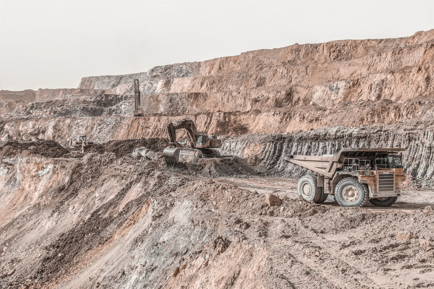 Fleet Of Mining Trucks At Open Pit Mine — Choosing Quality Mining Truck Exhaust Parts