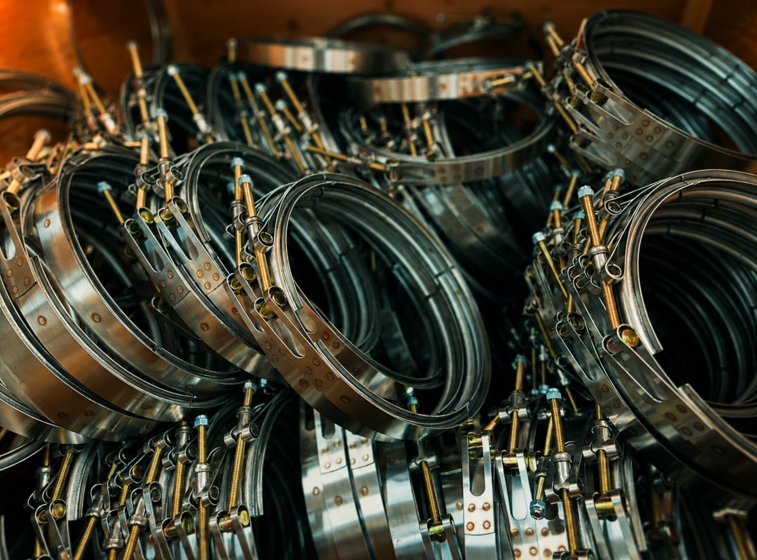 Pile Of Stainless Steel V-Band Clamps For Mining Trucks